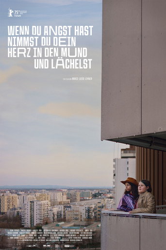 Cartel de Wenn du Angst hast nimmst du dein Herz in den Mund und lächelst